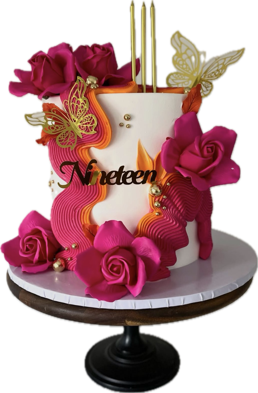 Floral birthday cake with gold butterflies and pink roses