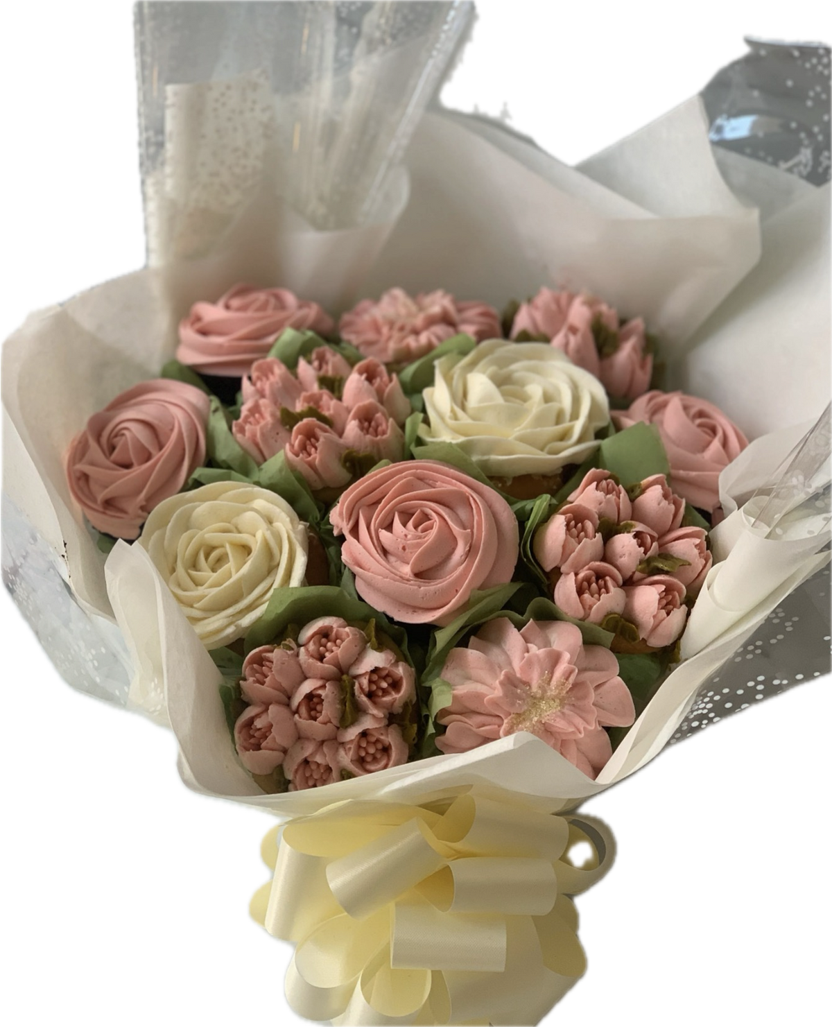 Purple and pink cupcake bouquet in round gift box